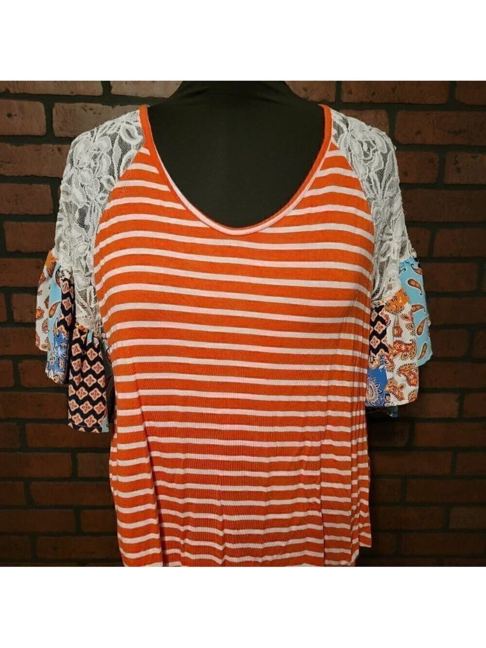 Adora mixed material top with lace.   Size Small.
